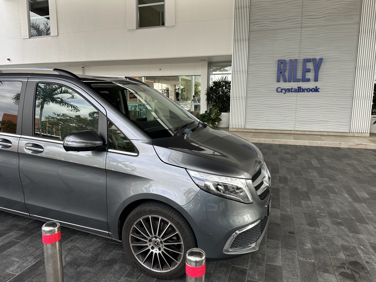 Private transfer van at a Cairns City hotel pickup